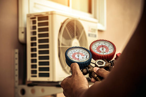 Professional Hvac Installation technician working in Maylene, AL